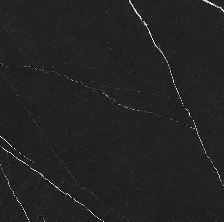 black marble with white streaks on it