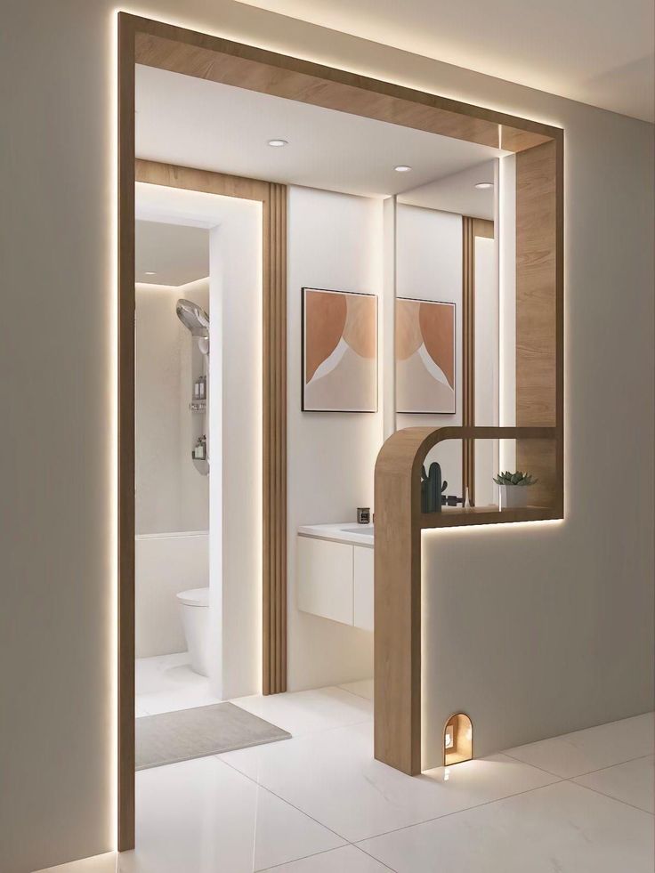 an open door leading to a bathroom with white tile floors and walls, illuminated by recessed lighting