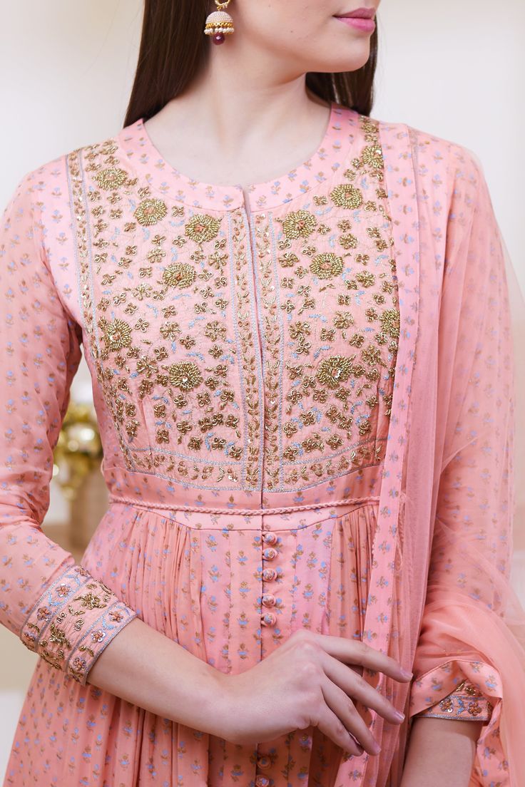 Editor's Note This set features a zardozi embroidered block printed anarkali set. Color: Peach Fabric: Silk; Satin Georgette; Flat Chiffon Embroidery Details: Zardozi Care: Dry Clean Only Customize Your Outfit Can't find the size you're looking for? No stress. Just select the size "Custom" while adding the item to your cart. We will follow up with you for your body measurements. To request a color or design customizations, please contact our customer care by using our "Ask us a question" form or Chiffon Embroidery, Blouse Yoke, Printed Anarkali, Silk Anarkali, Peach Fabric, Zardozi Embroidery, Embroidered Anarkali, Kurti Designs Party Wear, Casual Tunics