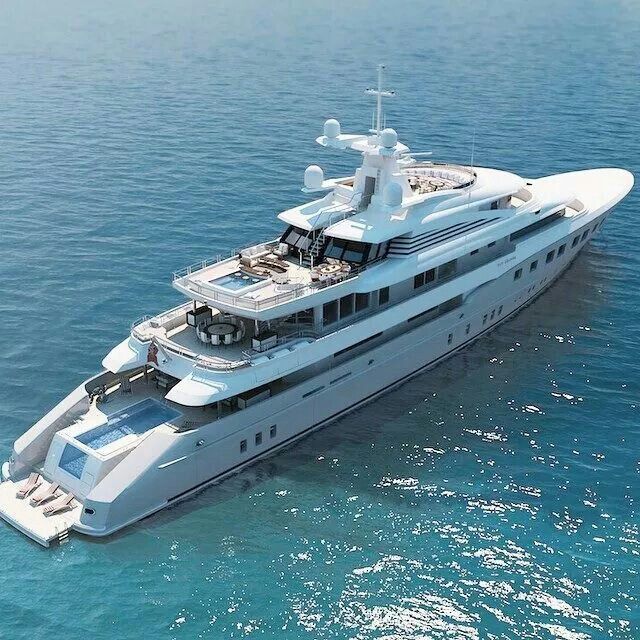 a large white boat floating on top of the ocean