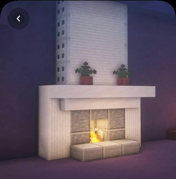 a fire place in the middle of a room next to a window with plants on it