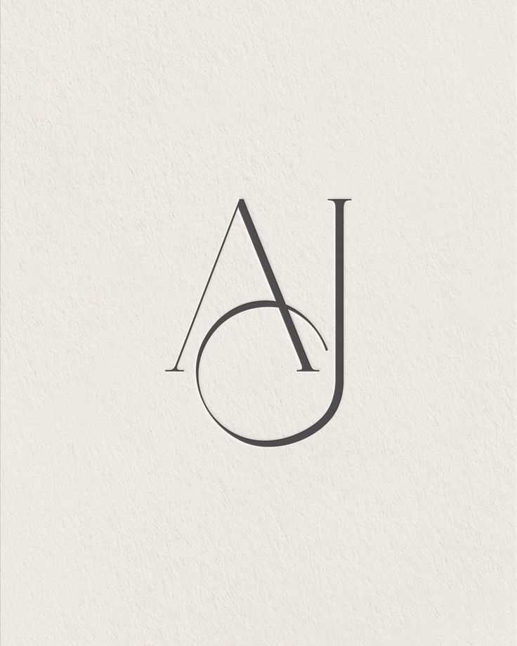 the letter j is made up of black and white lines on a white paper background