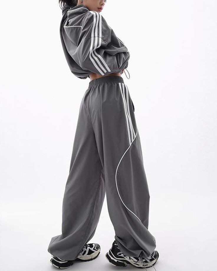 Details: Long cargo pants with pockets designBottom Length: LongMaterials:95% Polyester + 5% Spandex Athleisure Wide-leg Parachute Pants With Pockets, Sportswear Pants With Pockets Full Length, Baggy Sportswear Pants With Elastic Waistband, Sportswear Baggy Pants With Elastic Waistband, Gray Athleisure Cargo Pants With Pockets, Sportswear Wide Leg Parachute Pants With Pockets, Baggy Wide Leg Sportswear Bottoms, Sportswear Parachute Pants With Pockets, Oversized Sportswear Bottoms For Streetwear