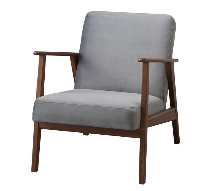 a gray chair with wooden frame and arm rests against a white background in front of it