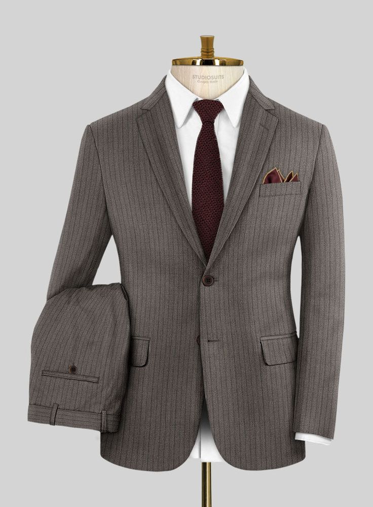 Get set to ace your upscale event with our Loro Piana Giovanni Wool Suit! Crafted impeccably from a luxurious wool blend, it's all about that soft touch and incredible comfort. With its brown hue and snazzy stripe pattern, this suit brings that extra oomph, perfect for flaunting your sophisticated side with a twist. So, own that charm, embrace this standout piece, and get ready to have everyone buzzing about your style prowess! 
  Choice of the Elite, Loro Piana is owned by LVMH Moët Hennessy Louis Vuitton SE, the French multinational luxury goods conglomerate, who is parent to the world's most luxurious brands ranging from Louis Vuitton, Christian Dior, Loewe, Givenchy, Celine and many more.  Look Includes    Loro     Piana     Giovanni     Wool  Fabric  Two Button Jacket Style  Notch Lap Brown Long Sleeve Three-piece Suit For Formal Occasions, Elegant Fitted Brown Three-piece Suit, Elegant Brown Workwear Sets, Brown Fitted Business Sets, Elegant Single-breasted Brown Sets, Elegant Brown Business Casual Sets, Elegant Brown Sets For Business Casual, Brown Wool Single Breasted Suit, Brown Wool Single-breasted Suits