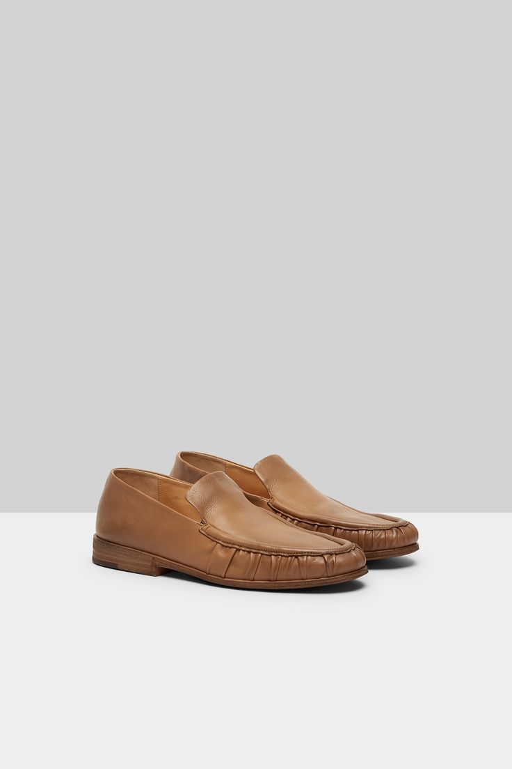 Mocassino Loafer Hazelnut Formal Calf Leather Slip-ons With Contrast Sole, Moc Toe Loafers With Contrast Sole For Work, Business Casual Moc Toe Loafers With Contrast Sole, Workwear Loafers With Moc Toe And Contrast Sole, Business Casual Loafers With Contrast Sole, Brown Moc Toe Loafers With Contrast Sole, Brown Moccasins With Contrast Sole For Formal Occasions, Formal Brown Moccasins With Contrast Sole, Slip-on Leather Lined Moc Toe Loafers