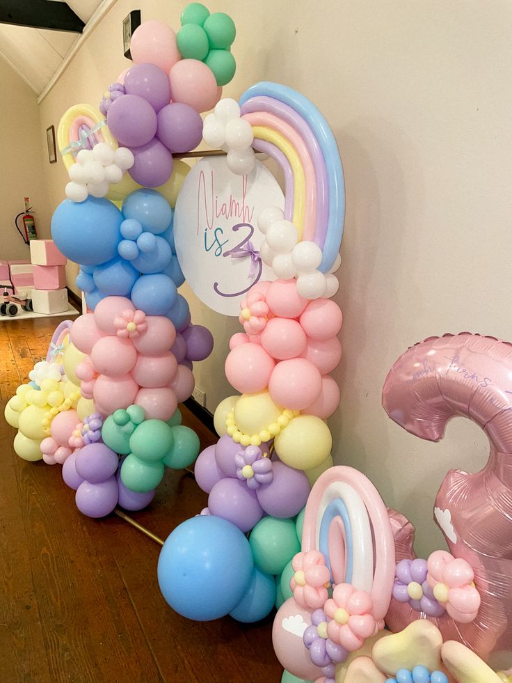 balloons are arranged in the shape of letters and numbers