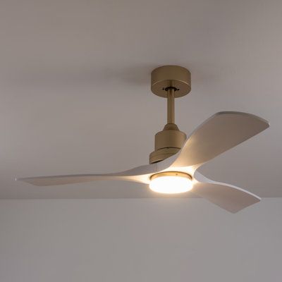 a ceiling fan that is on top of the ceiling in a room with white walls