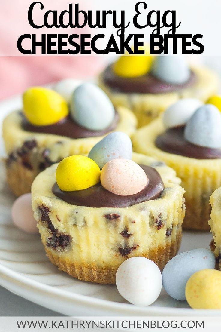 some cupcakes that are sitting on a white plate with chocolate and candy eggs