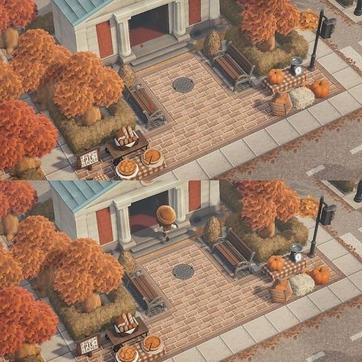 an aerial view of a house with pumpkins on the ground and trees in front