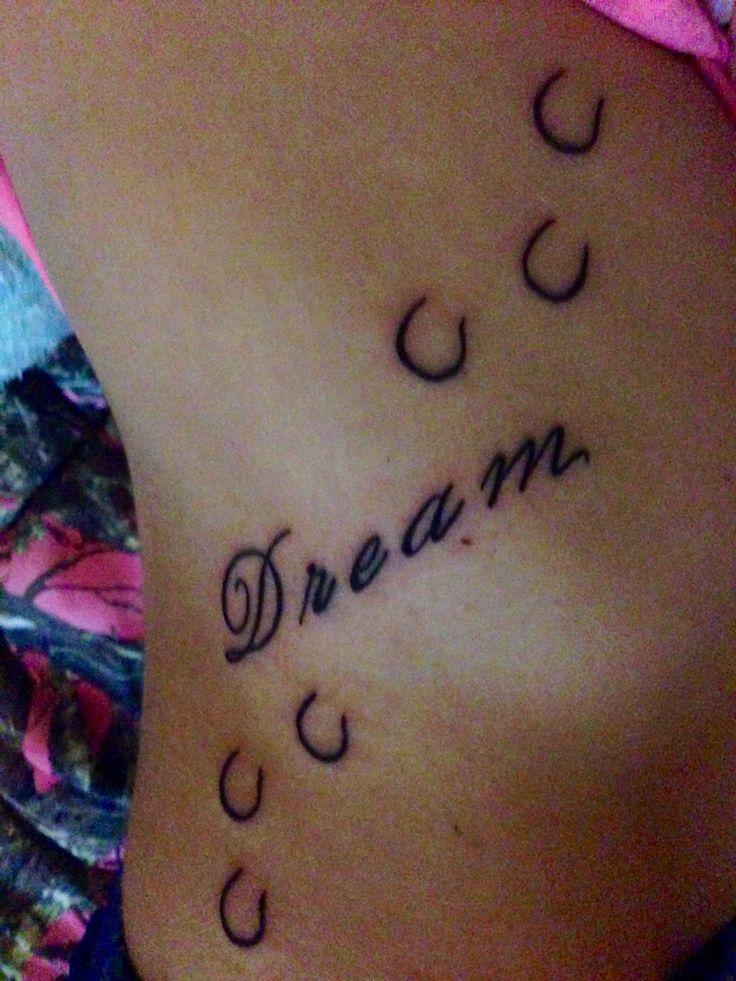 a woman's stomach with the words dream written on it