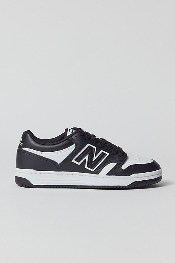 Classically cool New Balance Court 480 sneakers inspired by old-school basketball styles. Retro low-profile silhouette in premium paneled leather with perforated detailing. Lace-up style with a super cushy Ortholite insole and durable rubber soles. Features Retro-cool New Balance Court 480 sneakers Basketball-inspired for a slam-dunk look Comfy Ortholite insoles Lace-up style Content + Care Leather, rubber Spot clean Imported | New Balance 480 Court Sneaker in White/Black, Women's at Urban Outfitters Classic New Balance Skate Shoes With Boost Midsole, Sporty Low-top Basketball Shoes With Perforated Toe Box, Classic New Balance Skate Shoes For Streetwear, Sporty Skate Shoes With Perforations For Streetwear, Classic New Balance Basketball Shoes With Boost Midsole, Classic Basketball Shoes With Perforated Toe Box For Streetwear, New Balance Low-top Basketball Shoes, New Balance Classic Low-top Skate Shoes, New Balance Leather Basketball Shoes For Streetwear