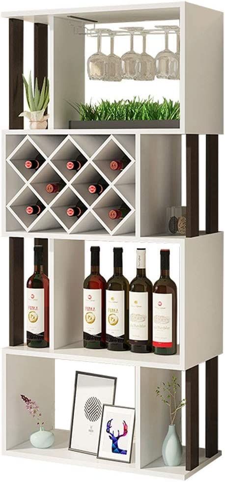 a white shelf filled with bottles of wine