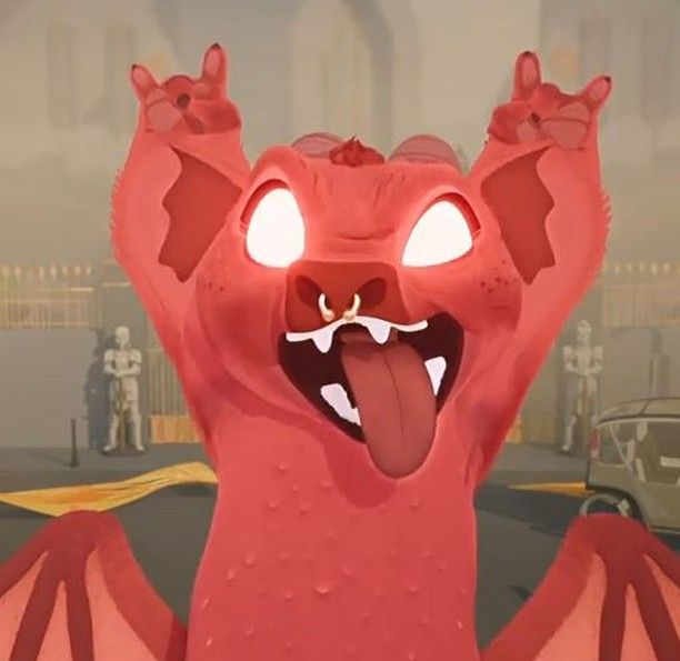 a red dragon with its tongue out and it's eyes wide open