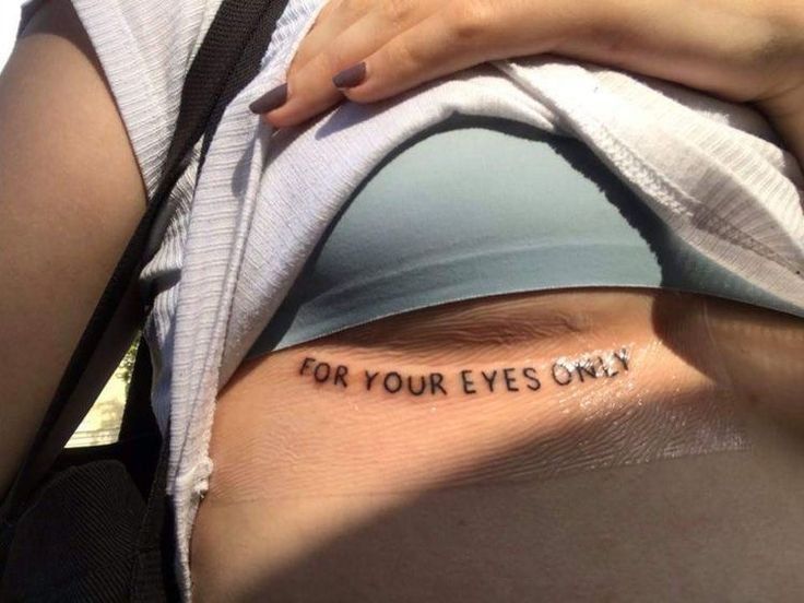 a woman's stomach with the words for your eyes only written on her belly