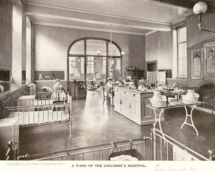 an old black and white photo of a hospital