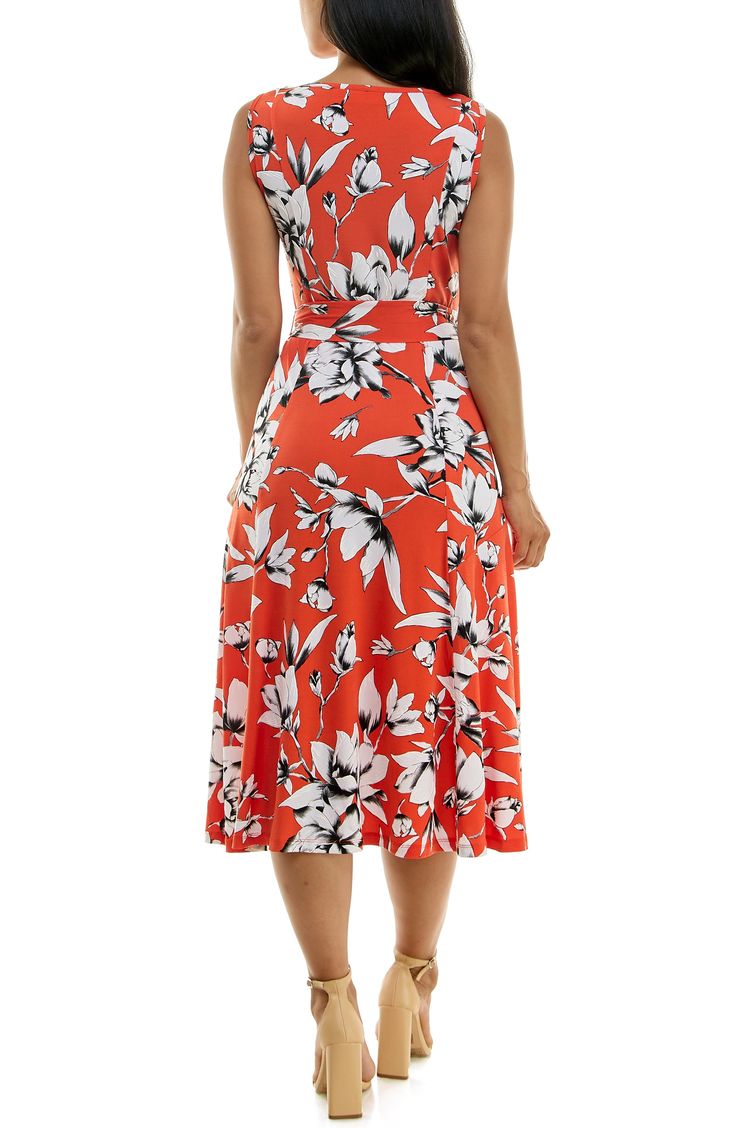 A vibrant printed midi dress is perfect for summer events. Fit: this style fits true to size. 50" length (size Medium) Crewneck Sleeveless Attached waist tie 95% polyester, 5% spandex Machine wash cold Imported Model stats: 5'10", 32" bust, 25" waist, 36" hip. Model is wearing size Medium. Sleeveless Midi Dress, Summer Events, Printed Midi Dress, Midi Dress Sleeveless, Bright Orange, Waist Tie, Nordstrom Rack, Midi Dress, Nordstrom