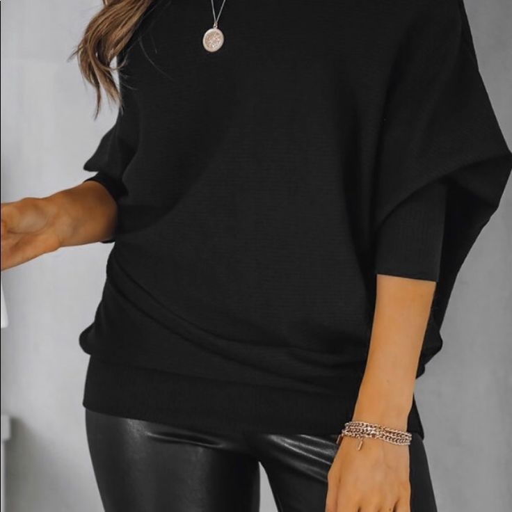 Black Off Shoulder Ribbed Texture Raglan Long Sleeve Top 95% Polyester; 5% Spandex Neckline: Slash Neck Sleeve Length: Full Sleeve -Off Shoulder Design For An Effortlessly Sensual Style -Raglan Sleeves Deliver Ease And Fashion Forward Style -Fine Ribbed Texture -A Slightly Relaxed Silhouette Keeps This Look Comfy And Versatile Black Oversized Chic Knit Top, Oversized Black Chic Knit Top, Chic Stretch Batwing Sleeve Sweater, Chic Stretch Sweater With Batwing Sleeves, Versatile Black Crew Neck Sweater, Black Knit Top For Fall Night Out, Oversized Black Knit Top With Crew Neck, Oversized Black Crew Neck Knit Top, Fall Stretch Tops With Batwing Sleeves