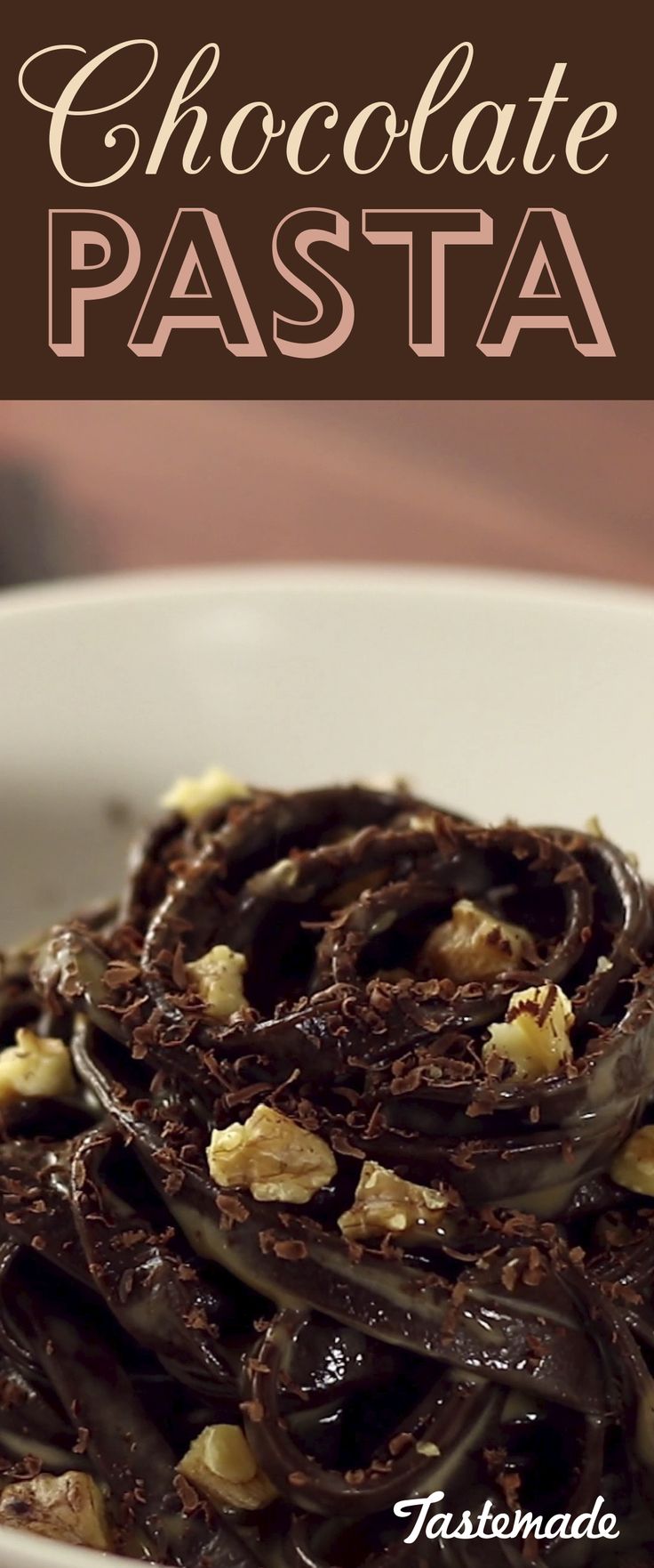 chocolate pasta in a white bowl with walnuts on top and text overlay that reads chocolate pasta