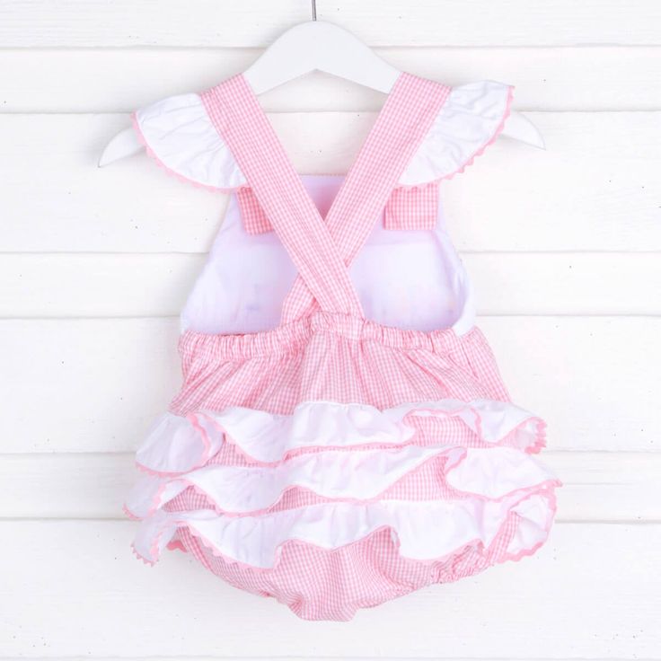 Adorable light pink gingham ruffle bubble! Features birthday girl smock plate and ric rac trim. Perfect for a birthday! Cute Ruffled Sets For Playtime, Cute Ruffled Sets For Playwear, Cute Ruffled Playwear Sets, Playful Ruffle Bubble Romper For Playdate, Cute Pink Bubble Romper With Smocked Back, Fitted Bubble Romper With Ruffles For Cake Smash, Fitted Ruffle Bubble Romper For Cake Smash, Playful Ruffled Sets For Playtime, Sleeveless Ruffled Sets For Playdate