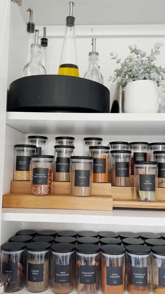 spice cabinet organization with jars and spices