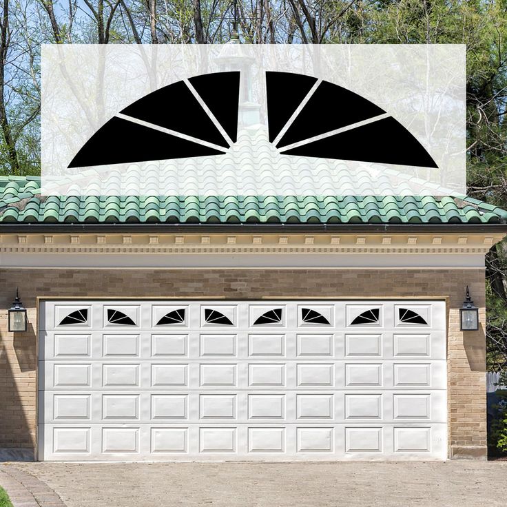 an image of a house with two garage doors and a green roof that has the same design on it