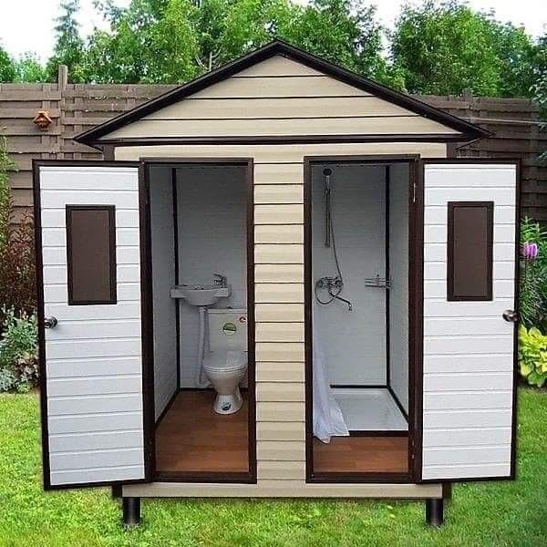 a small shed with two toilets in it