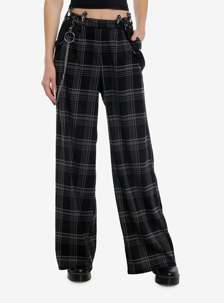 Amp up your punk outfit with these wide leg trouser pants! They have an allover black and grey plaid design and come with removable suspender straps and a silver-tone side cha. Complete with hip and back pockets. Please note: Style is fitted with no stretch; size up for a looser fit. Purple And Black Plaid Pants, Black Plaid Pants, Types Of Clothing Styles, Punk Outfit, Hot Topic Clothes, Random Clothes, Plaid Trousers, Concert Fits, Punk Outfits