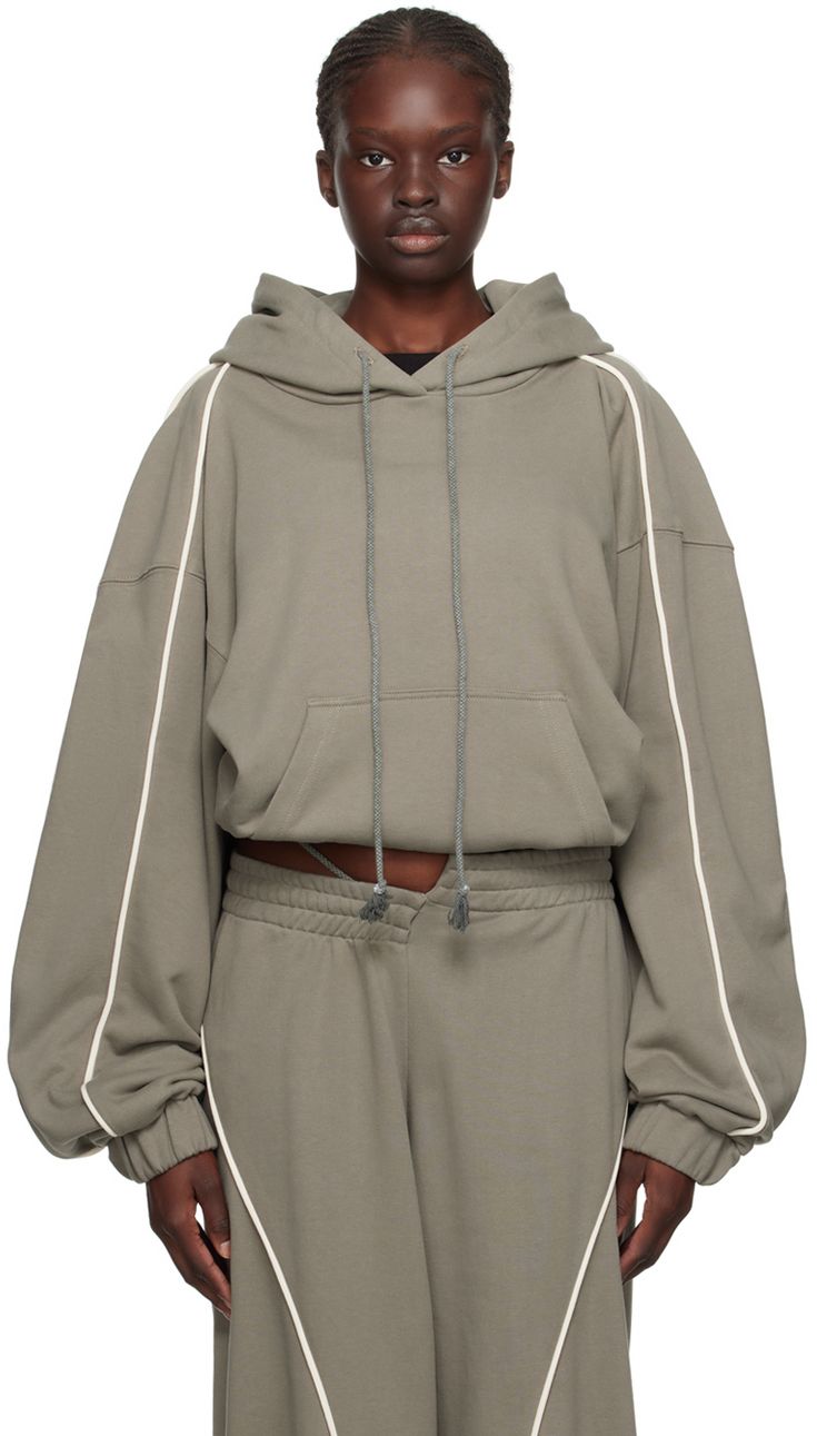 French terry hoodie. · Drawstring at hood · Kangaroo pocket · Elasticized cropped hem and cuffs · Piping at sleeves · Dropped shoulders Supplier color: Sage Patagonia Street Style, Hoodie Techwear, Adventure Fashion, Fashion Draping, Sportswear Outfits, Sports Wear Women, French Terry Hoodie, Hoodie Brands, Looks Street Style