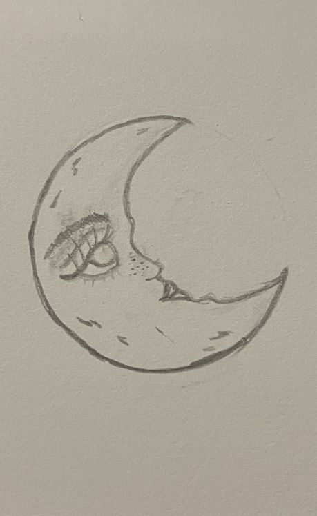 a drawing of a half moon with a fish on it