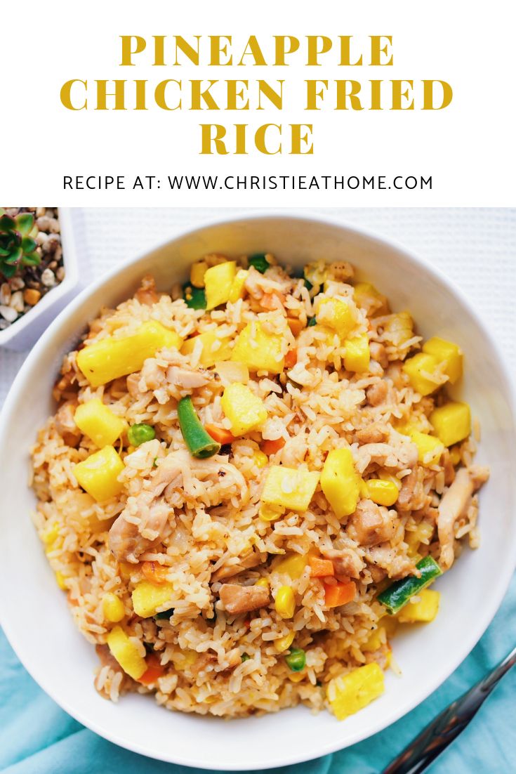 pineapple chicken fried rice in a white bowl