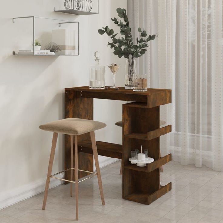 a wooden desk and stool in a room