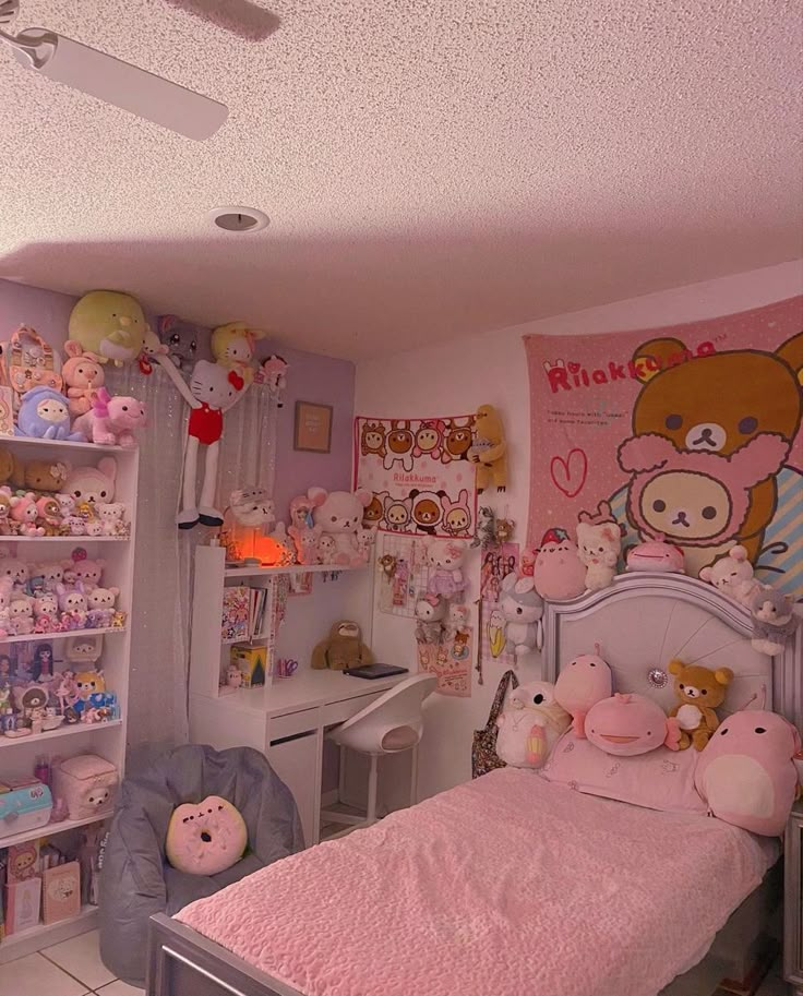 a bedroom with pink walls and teddy bears on the wall