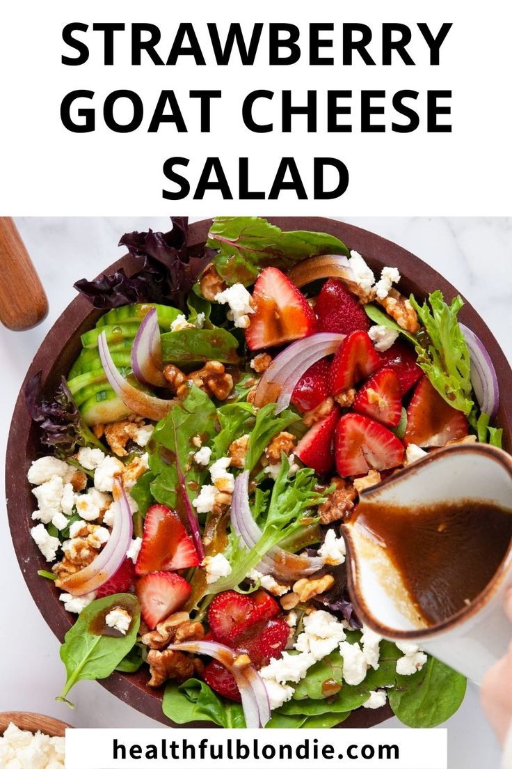 a salad with strawberries and goat cheese is shown in the middle of this image