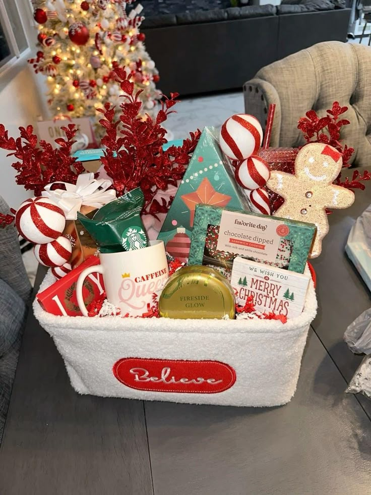 a white basket filled with lots of christmas items