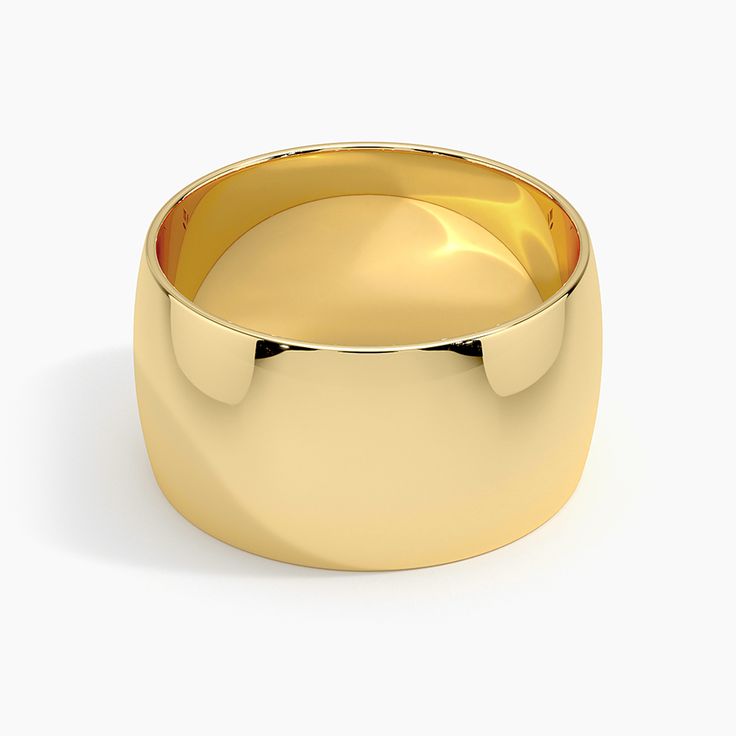 a yellow gold wedding ring on a white background with clipping path to the top