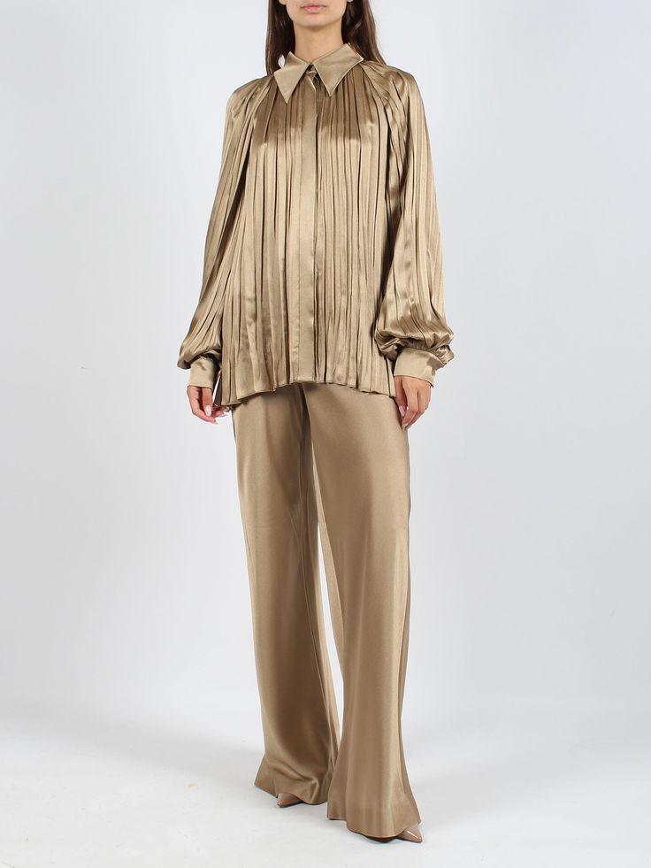 Alberta Ferretti pleated satin shirt. - FW24 - Regular fit - Pointed collar - Hidden button closure - Raglan sleeve - Single-button cuffs - Asymmetric hem - Made in Italy - 64% Acetate, 36% Silk Elegant Pleated Silk Tops, Designer Satin Blouse For Work, Elegant Pleated Evening Blouse, Elegant Pleated Silk Blouse, Chic Pleated Silk Top, Elegant Pleated Blouse For Evening, Elegant Silk Pleated Blouse, Chic Silk Pleated Top, Designer Satin Tops For Workwear