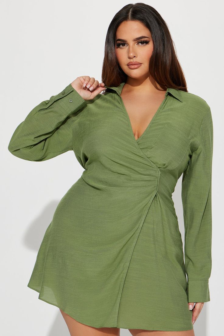 Available In Green. Mini Dress Long Sleeve Collar Surplice Ruched Wrap Detail Invisible Side Zipper Self: 65% Viscose 35% Polyester Lining: 97% Polyester 3% Spandex Imported | Autumn Nights Mini Dress in Green size Large by Fashion Nova Green V-neck Shirt Dress For Date Night, V-neck Shirt Dress With Button Closure For Date Night, Solid V-neck Shirt Dress With Buttons, Fitted Green V-neck Shirt Dress, Green Long Sleeve Printed Mini Dress, Casual Green Mini V-neck Dress, Green Button-up Mini Dress For Day Out, Green V-neck Shirt Dress, Solid V-neck Mini Dress With Button Closure