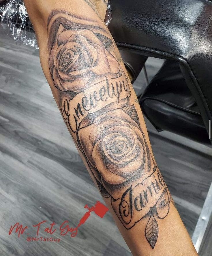 a woman's arm with roses and the words love story written in cursive writing