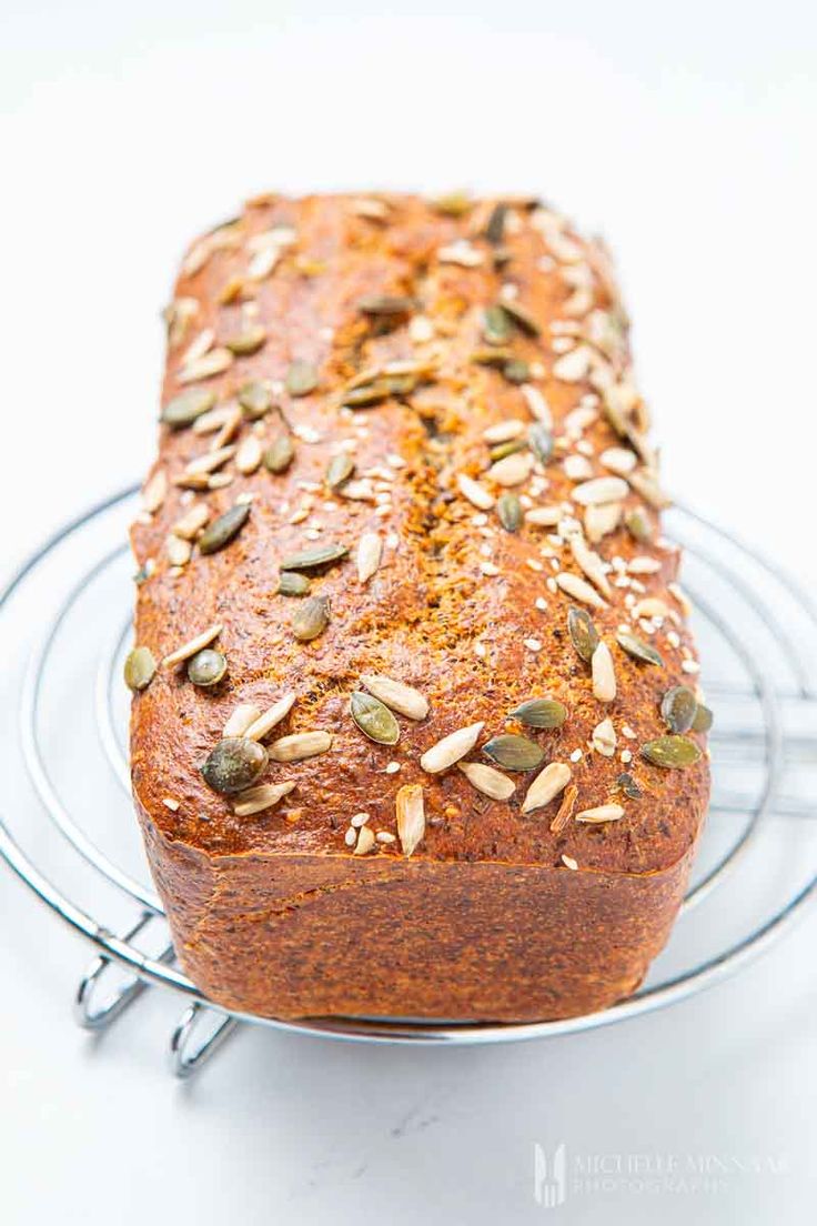 a loaf of bread sitting on top of a wire rack