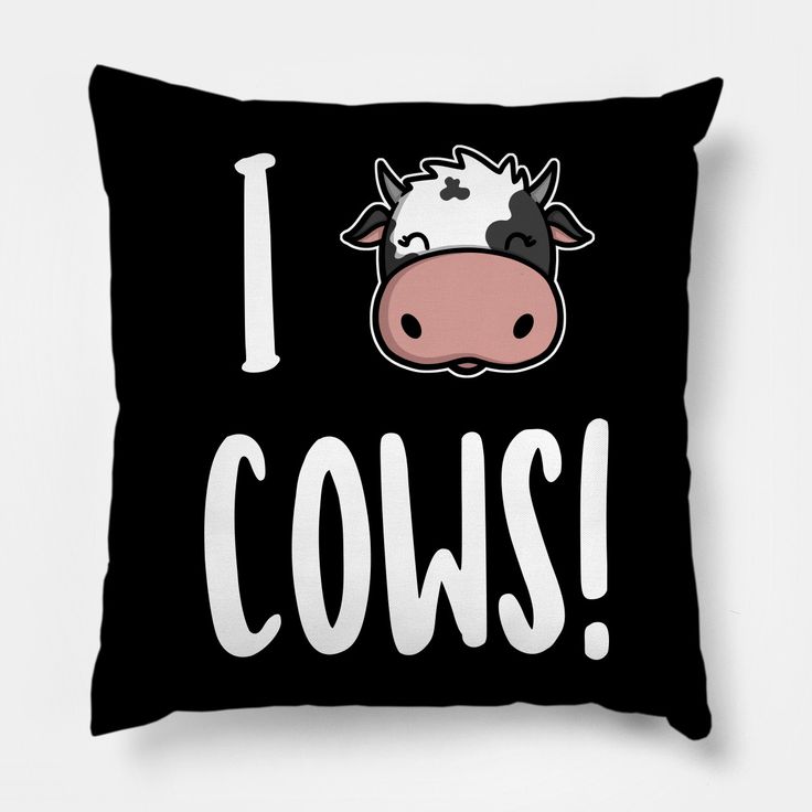 a black and white pillow with the words i cows on it