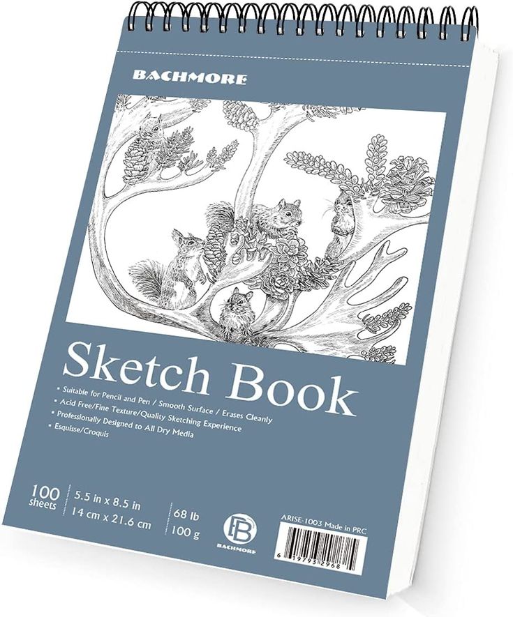 a sketch book with trees and animals on it