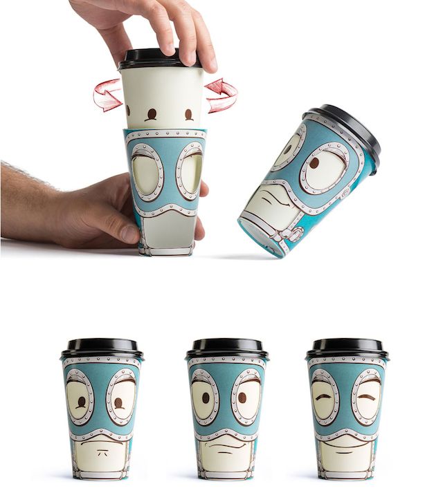 a hand holding a coffee cup with four different designs on it