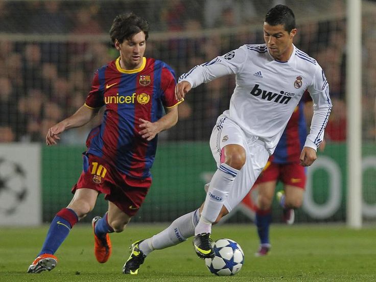 two men are playing soccer on the field