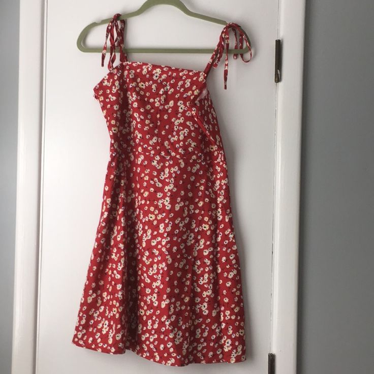 Brand New / Never Worn; Without Tags. (Shein Doesn’t Use Tags). Super Cute And Cool Sundress With Adjustable/Tie Straps. Red With Yellow/White/Blue Flowers! Zipper On Left Side. Casual Red Printed Mini Dress, Casual Red Printed Sundress, Red Tie Back Mini Dress For Summer, Red Cotton Summer Mini Dress, Red Cotton Mini Dress For Summer, Casual Red Mini Dress With Tie Back, Red Mini Dress For Summer Daywear, Red Tie-back Dress For Day Out, Red Tie Back Dress For Day Out