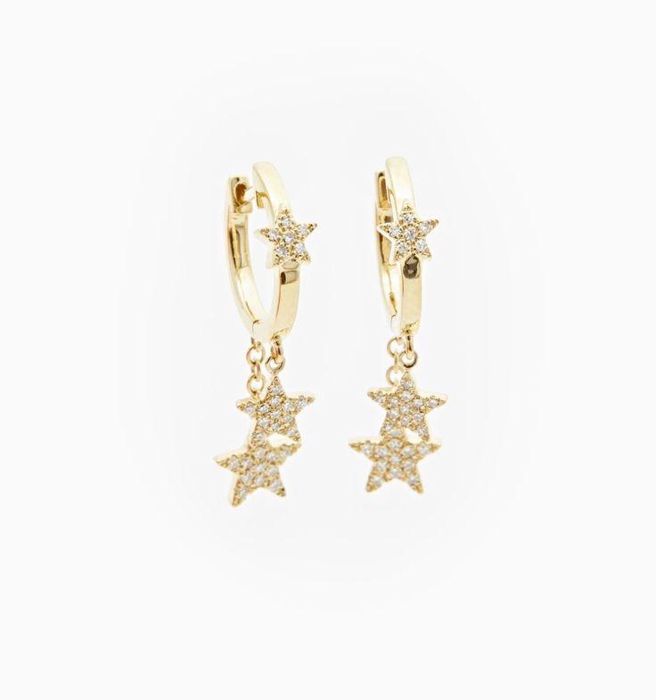 A stunning pair of star drop earrings embezzled with diamonds. Made to sparkle all night, wear them solo for a super cute look or stack with other favorites for a funky look. Made to mix and match with the rest of your earring collection. We love how versatile these lovely studs are. Diamond Star Earrings, Star Drop Earrings, Mode Zara, Earring Collection, Jewelry Accessories Ideas, Jewelry Essentials, Stacked Jewelry, Jewelry Lookbook, Night Wear