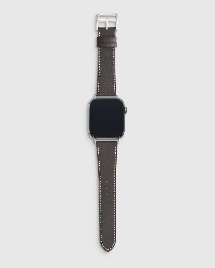 The best in tech meets the finest in fashion with our Leather Apple Watch Band. Hand crafted from the finest top-grain calf leather, this band features sleek saddle stitching and a stainless steel buckle. Designed to last a lifetime, this piece is a smartest choice for your smart watch.  | Quince | Leather Apple Watch Band in Charcoal, Size 38mm 42mm, Size 38mm - 42mm Goose Down Pillows, Leather Apple Watch Band, Apple Watch Sizes, Linen Sheet Sets, Apple Watch Bands Leather, Apple Watch Band, Apple Watch Series, Leather Band, Quince