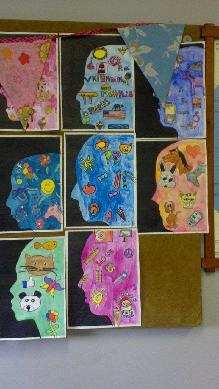 a bulletin board with many different pictures on it, including people's faces and animals