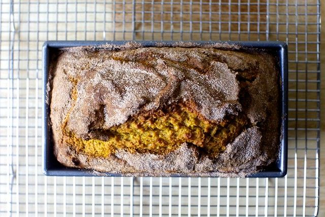 a loaf of bread sitting on top of a cooling rack