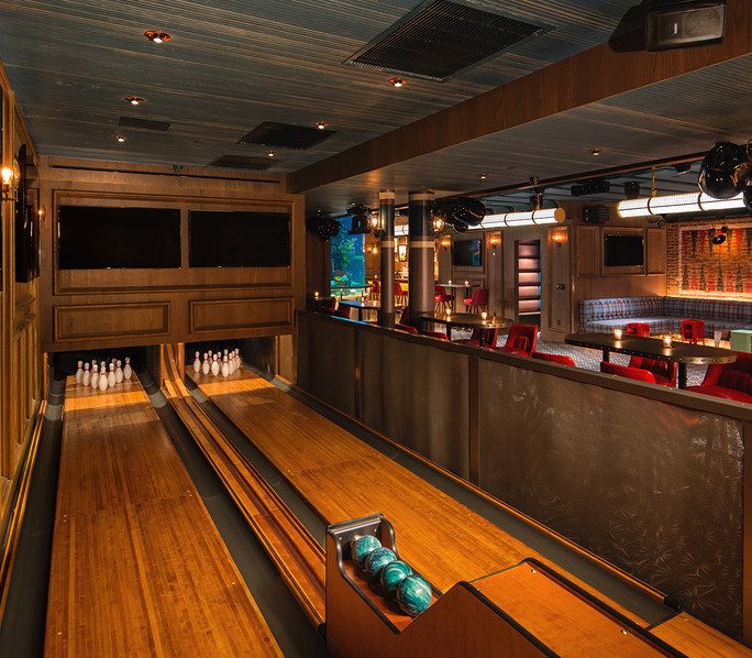 the bowling alley is empty and ready for people to use it as an entertainment venue